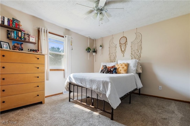 11576 Peach Glen Ave NW, Uniontown, OH 44685 - carpeted bedroom featuring a textured ceiling and ceiling fan