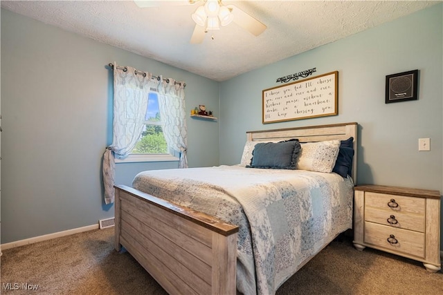11576 Peach Glen Ave NW, Uniontown, OH 44685 - bedroom featuring carpet flooring, a textured ceiling, and a ceiling fan