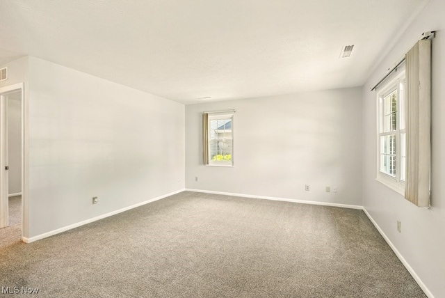3820 Twin Pines Dr Unit 8A, Uniontown, OH 44685 - unfurnished room with carpet floors and baseboards