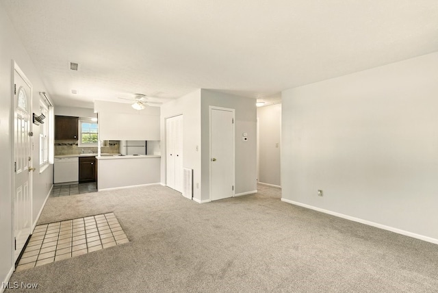 3820 Twin Pines Dr Unit 8A, Uniontown, OH 44685 - unfurnished living room featuring carpet floors and ceiling fan
