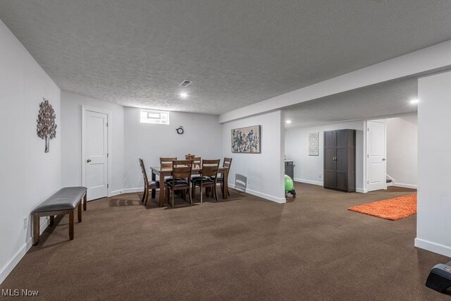 12187 Bexley Dr, Grafton, OH 44044 - carpeted dining space featuring a textured ceiling