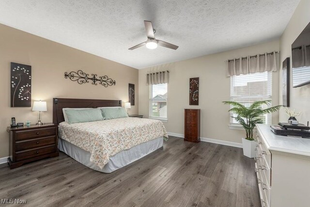 12187 Bexley Dr, Grafton, OH 44044 - bedroom with wood finished floors, a textured ceiling, and ceiling fan