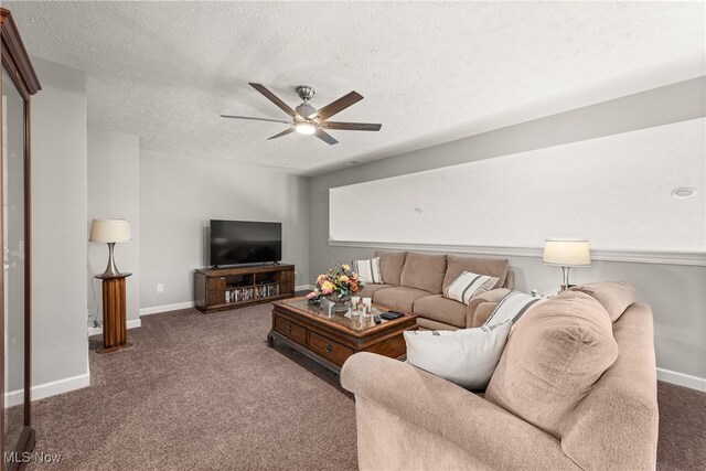 12187 Bexley Dr, Grafton, OH 44044 - living room featuring carpet flooring, ceiling fan, and a textured ceiling