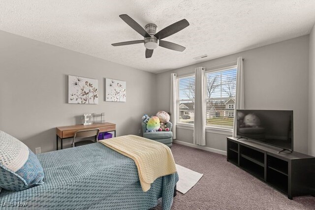 12187 Bexley Dr, Grafton, OH 44044 - carpeted bedroom featuring a textured ceiling and ceiling fan