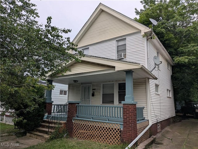 3943 W 22nd St, Cleveland, OH 44109 - view of front of property with covered porch and crawl space