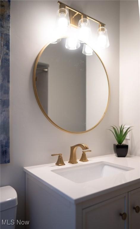 341 Clarmont Rd, Willowick, OH 44095 - bathroom featuring vanity and toilet