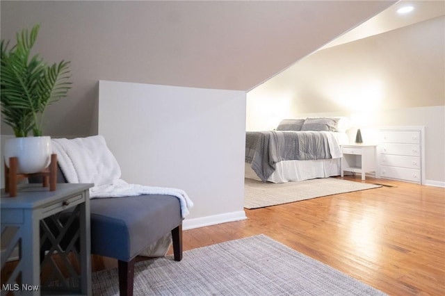 341 Clarmont Rd, Willowick, OH 44095 - bedroom with lofted ceiling and wood finished floors