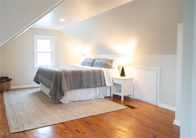 341 Clarmont Rd, Willowick, OH 44095 - bedroom featuring vaulted ceiling and wood finished floors
