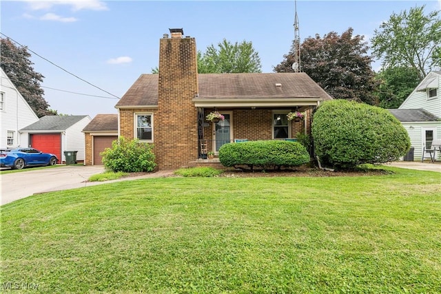 2026 34th St NW, Canton, OH 44709 - view of front facade featuring brick siding, a front yard, a chimney, and a garage