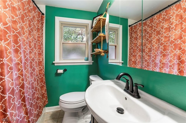2026 34th St NW, Canton, OH 44709 - bathroom with tile patterned floors and curtained shower