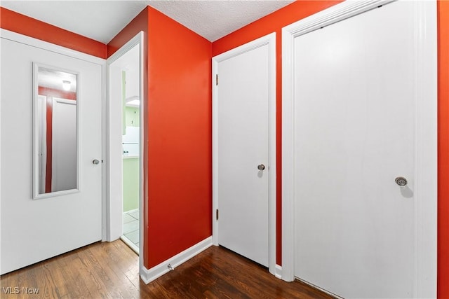 2026 34th St NW, Canton, OH 44709 - foyer with wood finished floors and baseboards