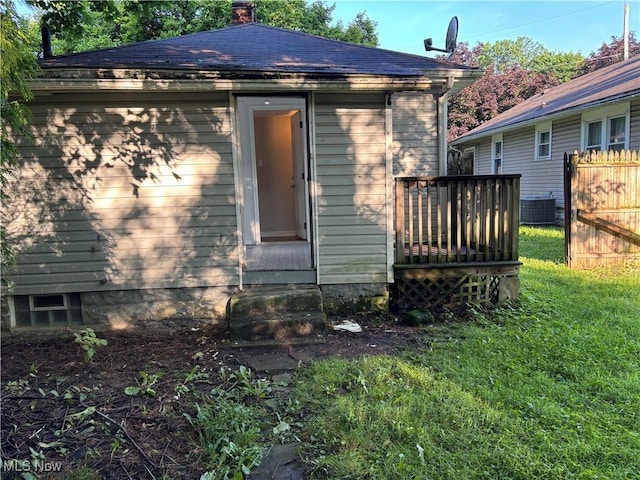 713 Virginia Ave, Akron, OH 44306 - back of house with entry steps and a chimney