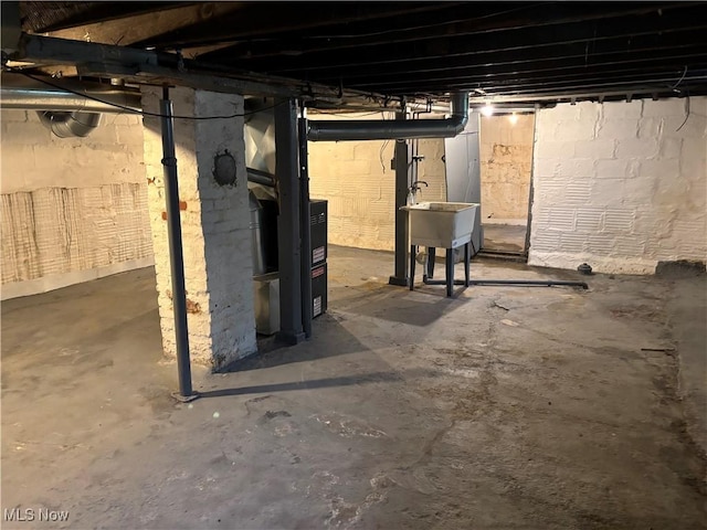 713 Virginia Ave, Akron, OH 44306 - unfinished below grade area with a sink