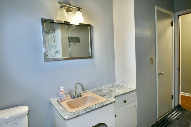 2803 Brunswick Rd, Youngstown, OH 44511 - bathroom with vanity and toilet