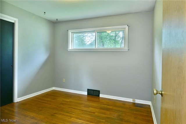2803 Brunswick Rd, Youngstown, OH 44511 - empty room featuring wood finished floors and baseboards