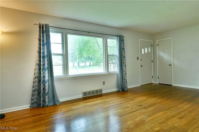 2803 Brunswick Rd, Youngstown, OH 44511 - unfurnished room with wood finished floors and baseboards