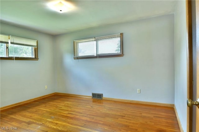 2803 Brunswick Rd, Youngstown, OH 44511 - spare room featuring wood finished floors and baseboards