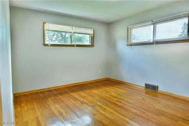 2803 Brunswick Rd, Youngstown, OH 44511 - empty room with hardwood / wood-style flooring and baseboards