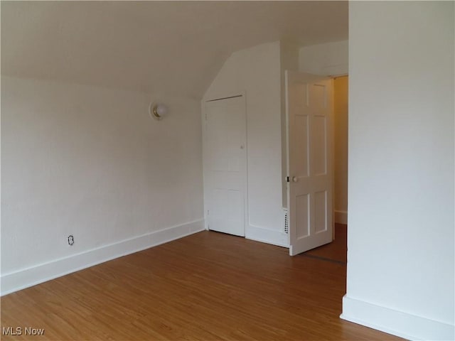 274 Wheeler St, Akron, OH 44304 - unfurnished room with wood finished floors and lofted ceiling