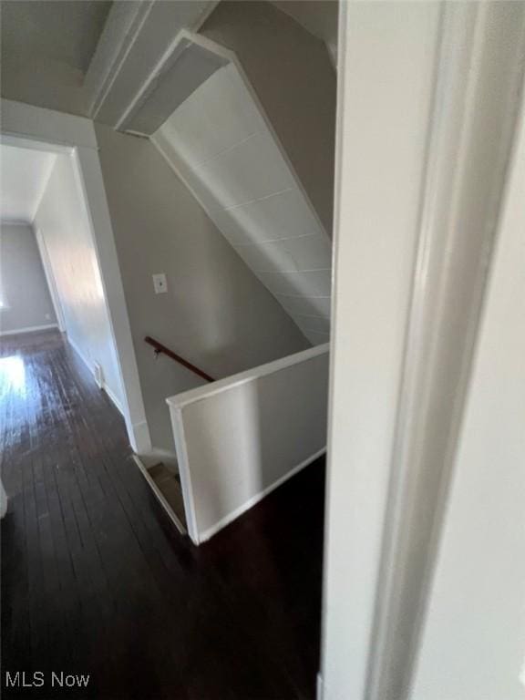 836 E 236th St, Euclid, OH 44123 - corridor featuring an upstairs landing, dark wood-style flooring, and lofted ceiling