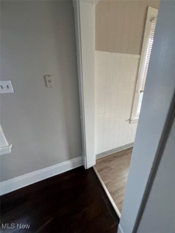 836 E 236th St, Euclid, OH 44123 - hall with wood finished floors and baseboards