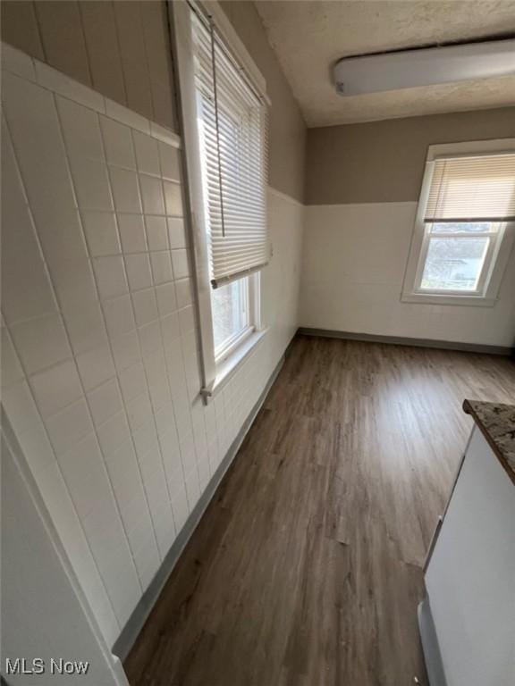 836 E 236th St, Euclid, OH 44123 - unfurnished room featuring dark wood-style floors