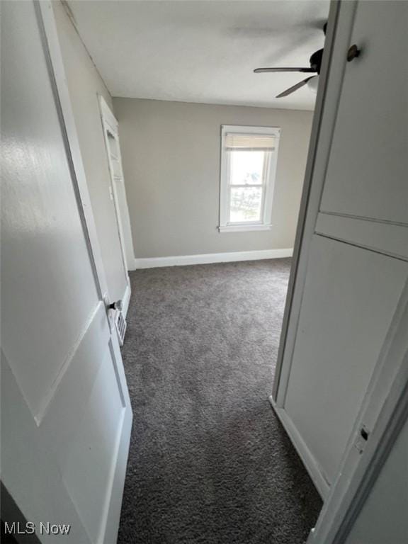 836 E 236th St, Euclid, OH 44123 - unfurnished bedroom featuring carpet flooring, a ceiling fan, and freestanding refrigerator