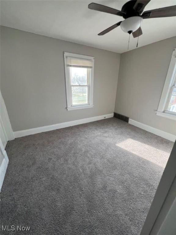 836 E 236th St, Euclid, OH 44123 - carpeted empty room featuring a ceiling fan and baseboards