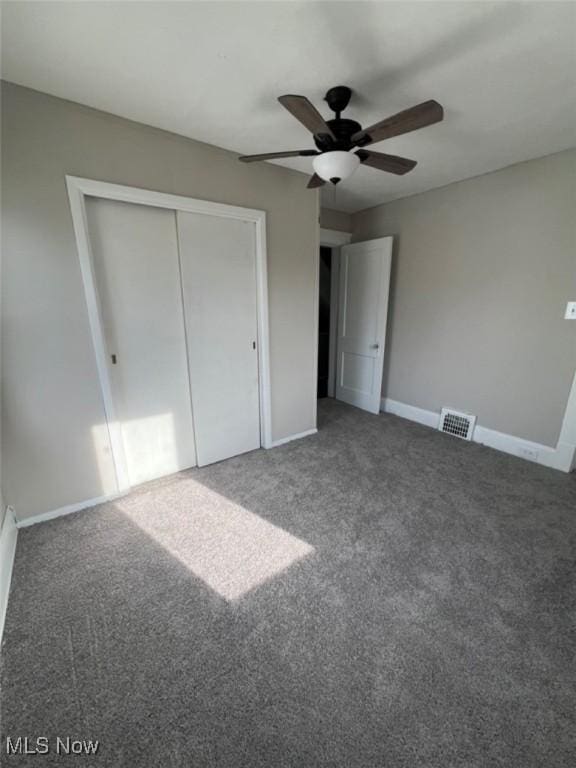 836 E 236th St, Euclid, OH 44123 - unfurnished bedroom with a closet, carpet floors, and a ceiling fan