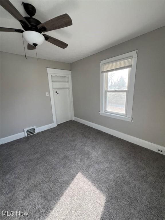 836 E 236th St, Euclid, OH 44123 - carpeted empty room featuring a ceiling fan and baseboards