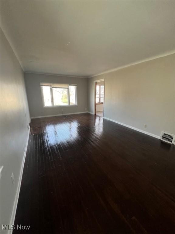 836 E 236th St, Euclid, OH 44123 - empty room with wood-type flooring and ornamental molding