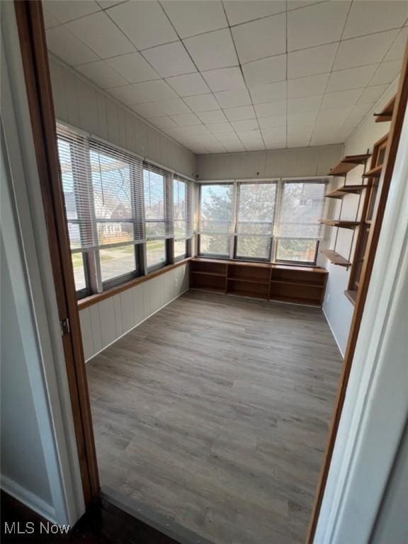 836 E 236th St, Euclid, OH 44123 - unfurnished sunroom with wood finished floors