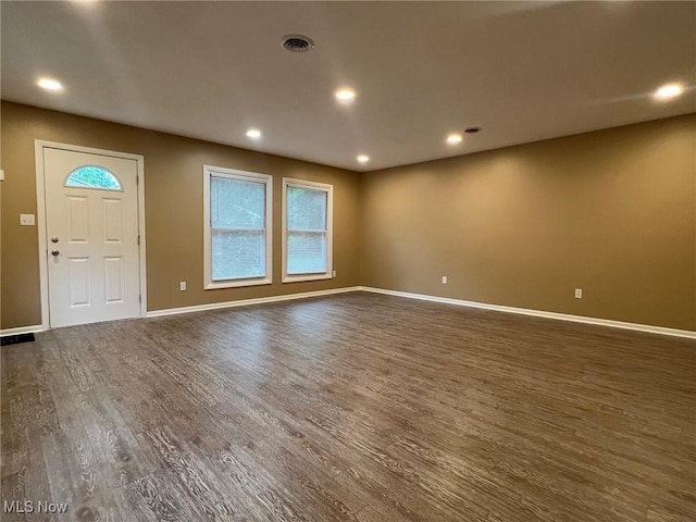 213 Turner Dr, Chardon, OH 44024 - spare room featuring healthy amount of natural light, dark wood-style flooring, and recessed lighting