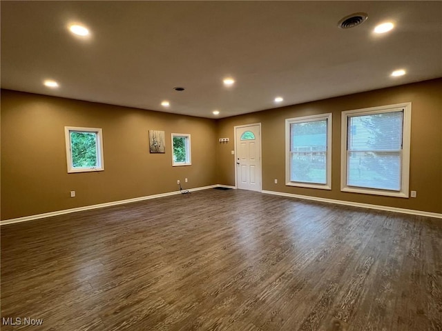 213 Turner Dr, Chardon, OH 44024 - unfurnished living room featuring dark wood-type flooring and recessed lighting