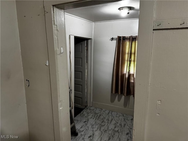 335 W New York Ave, Sebring, OH 44672 - corridor featuring marble look tile flooring