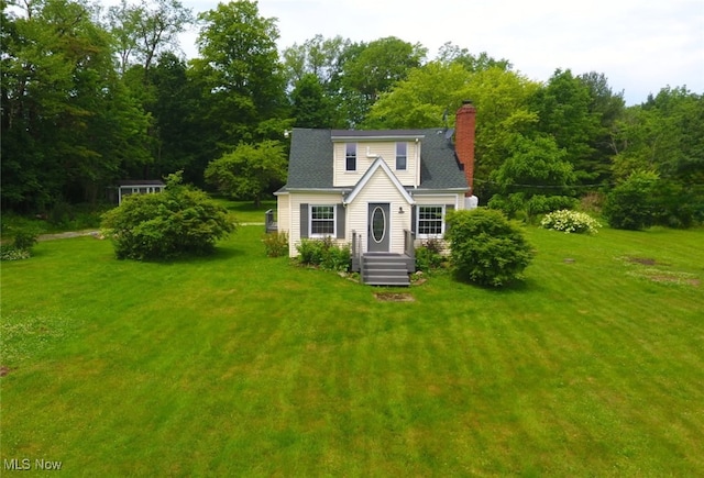 12779 State Route 700, Hiram, OH 44234 - view of front of house with a front yard and a chimney