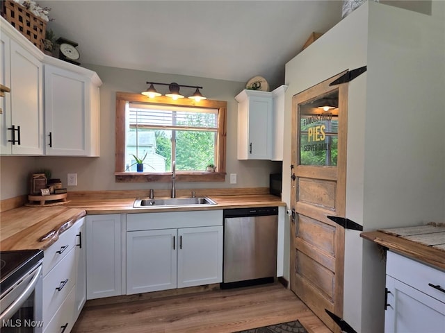 12779 State Route 700, Hiram, OH 44234 - kitchen with stainless steel appliances, white cabinetry, light wood-type flooring, butcher block countertops, and lofted ceiling