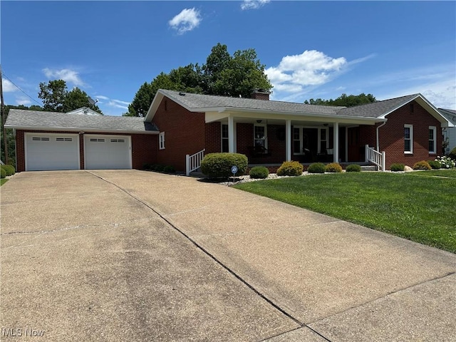 203 Park Ave, Middlebourne, WV 26149 - single story home featuring driveway, covered porch, brick siding, an attached garage, and a front lawn