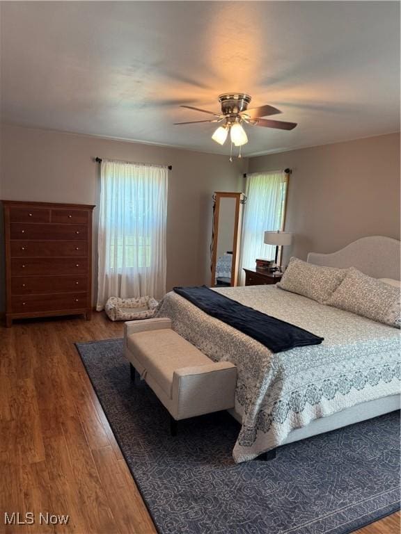 203 Park Ave, Middlebourne, WV 26149 - bedroom with wood finished floors and ceiling fan