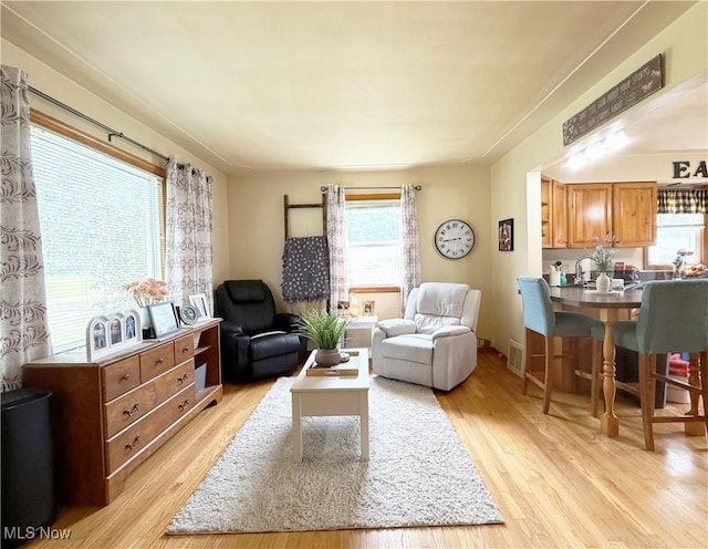 3522 Oakdale Ave, Lorain, OH 44055 - living room with healthy amount of natural light and light wood-type flooring