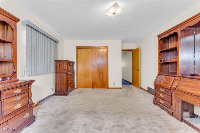 93 Olalla Ave, Tallmadge, OH 44278 - carpeted bedroom with baseboard heating and a closet
