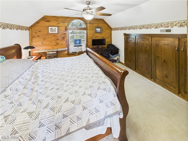 9246 State Route 555, Cutler, OH 45724 - bedroom featuring vaulted ceiling, wood walls, light colored carpet, and ceiling fan