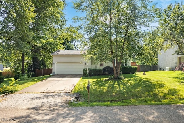 7298 Stonehill Ave NW, Canal Fulton, OH 44614 - view of property hidden behind natural elements featuring driveway and an attached garage