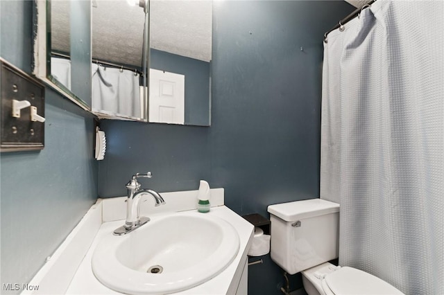 3594 Heckman St NW, Uniontown, OH 44685 - bathroom featuring vanity and a shower with shower curtain