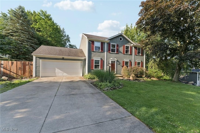 3594 Heckman St NW, Uniontown, OH 44685 - colonial house featuring driveway and an attached garage