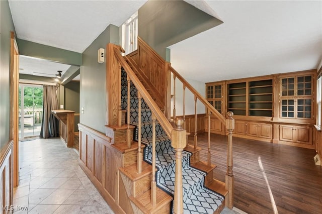 3594 Heckman St NW, Uniontown, OH 44685 - stairs featuring wainscoting