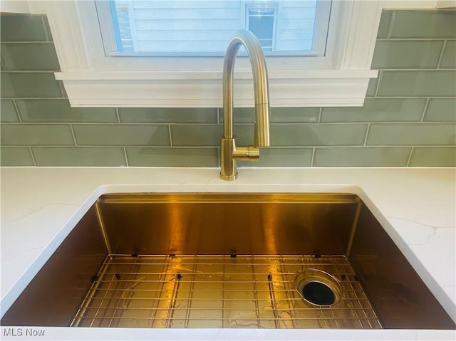 109 Avalon Ave, Bedford, OH 44146 - kitchen view of tasteful backsplash and light stone countertops