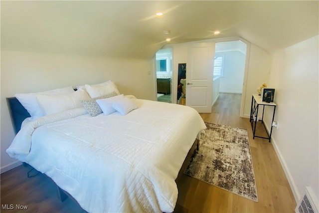 109 Avalon Ave, Bedford, OH 44146 - bedroom with wood finished floors, vaulted ceiling, and recessed lighting
