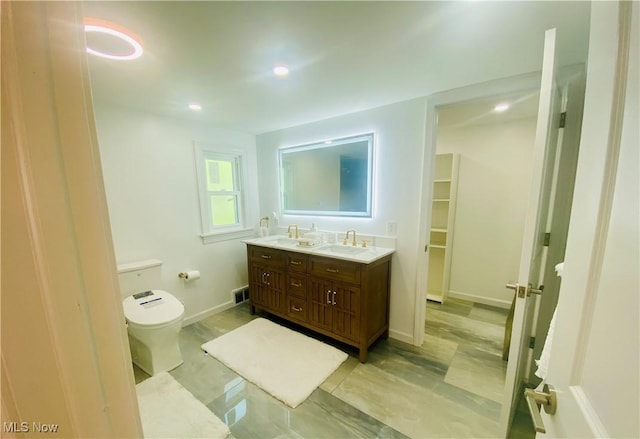 109 Avalon Ave, Bedford, OH 44146 - bathroom featuring double vanity and recessed lighting