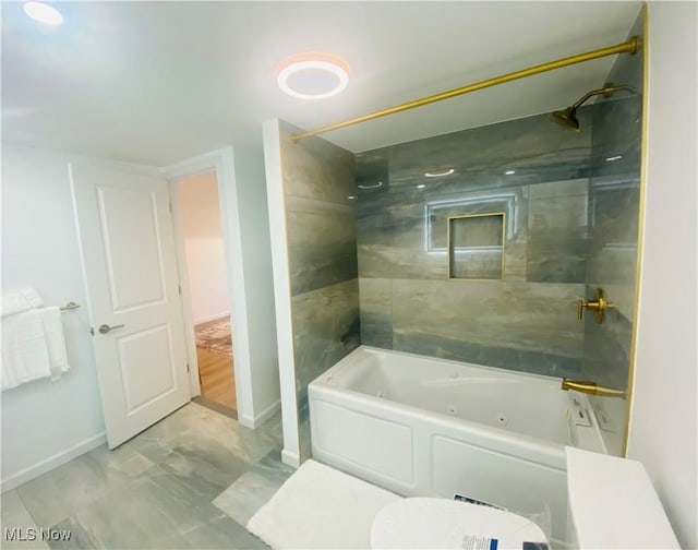109 Avalon Ave, Bedford, OH 44146 - bathroom with a combined bath / shower with jetted tub and baseboards
